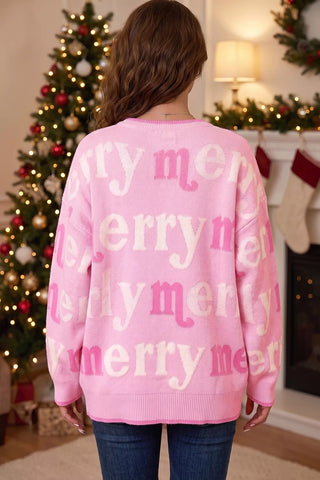 Back view of the pink Merry Me sweater showing the repeating merry lettering and ribbed hem.