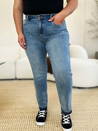 Front view of Judy Blue 88818 medium-wash jeans showing the pockets and released ankle hems.