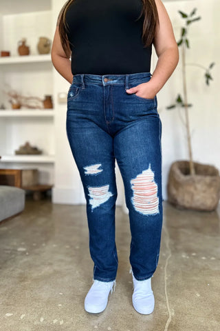 Front view of Judy Blue 88819 dark-wash straight jeans with heavy knee distressing and raw hems.