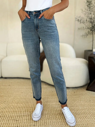 Front view of Judy Blue 88818 mid-rise jeans showing the dark released hems at the ankles.