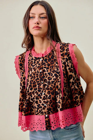 SO ME leopard blouse showing the button-up front, pink neckline trim and sleeveless shape.