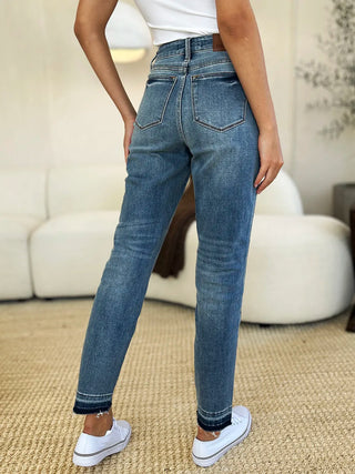Back view of Judy Blue 88818 medium-wash jeans showing rear pockets and dark ankle hems.