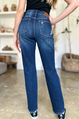 Back view of Judy Blue 88819 dark-wash straight jeans showing rear pockets and raw hems.