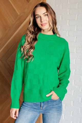 Green Jodifl A Song to Sing checkered-knit pullover, front view showing the tonal check pattern.