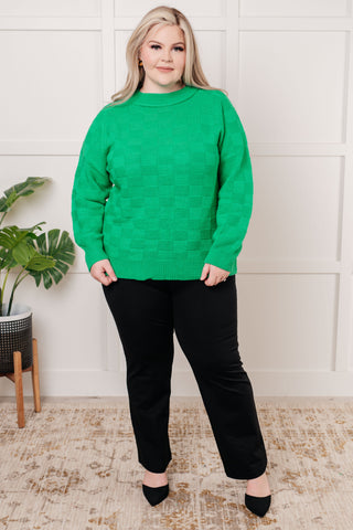 Green Jodifl A Song to Sing checkered-knit pullover, full outfit with black trousers and pumps.