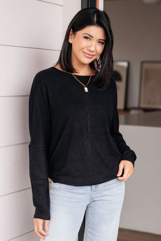 Black Very J Drive Downtown dolman-sleeve top, front view showing center seam.
