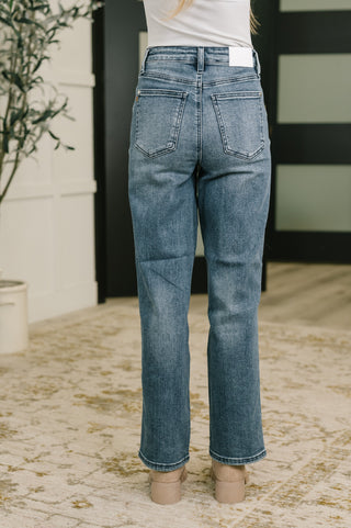 Judy Blue Carlie straight jeans in Everyday Indigo, back view showing rear pockets.