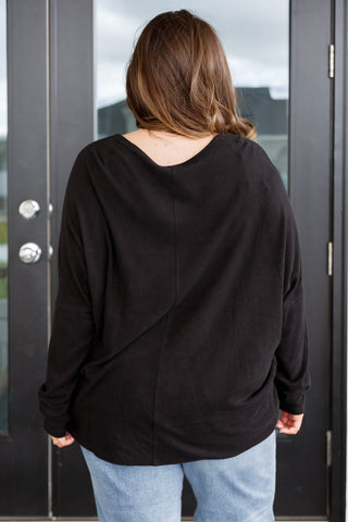 Black Very J Drive Downtown dolman-sleeve top, back view with distressed jeans.