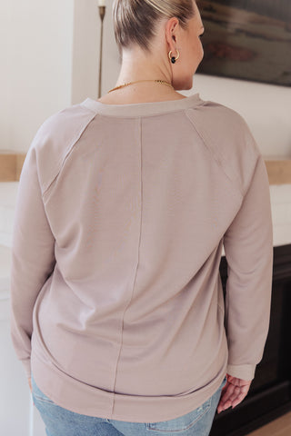 Taupe Sew In Love Less Conversation V-neck top, back view showing the neckline and straight hem.