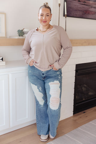 Taupe Sew In Love Less Conversation V-neck top, full outfit with distressed jeans.