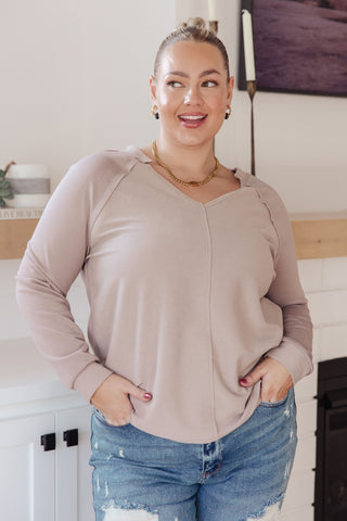 Taupe Sew In Love Less Conversation V-neck top, front view showing the notch neckline and center seam.