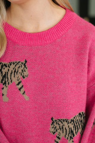 Pink BiBi Pretty and Prowling tiger-graphic pullover, close-up of tiger graphics and ribbed neckline.