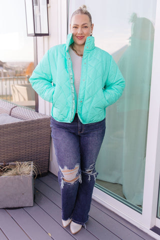 Aqua BiBi Slightly Distracted quilted puffer jacket, full outfit with ripped jeans.