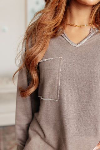 Taupe Sew In Love Spring In My Step V-neck pullover, close-up of the V-neckline and patch pocket.