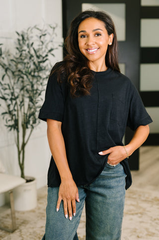 Black Dear Scarlett Layback relaxed tee, front view showing the center seam.