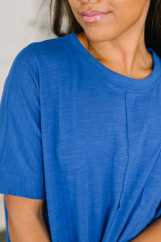 Royal-blue Dear Scarlett Layback relaxed tee, close-up of the round neckline and knit texture.