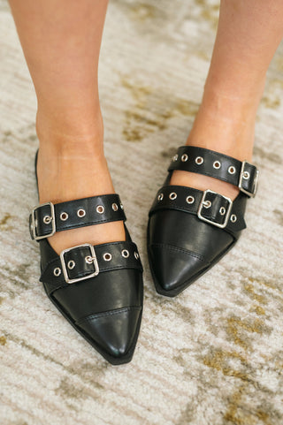 Black Soda Usual pointed-toe double-buckle flats, on-foot front view showing buckle straps.