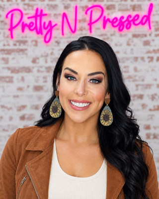 Natalie modeling Dreamy Flowers at Pretty N Pressed Boutique