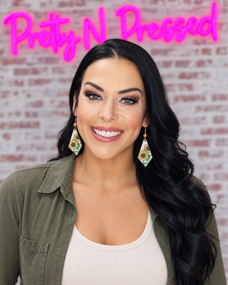 Natalie modeling Here comes the sun Earrings at Pretty N Pressed Boutique