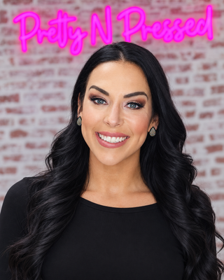 Natalie modeling Black Drip AB Earring at Pretty N Pressed Boutique