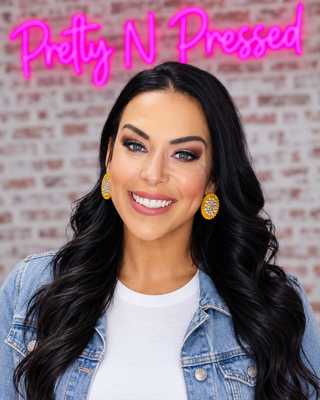 Natalie modeling Dazzle Earring at Pretty N Pressed Boutique