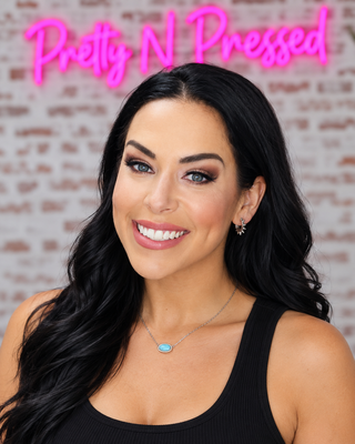 Natalie modeling La Susana at Pretty N Pressed Boutique
