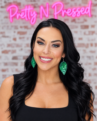 Natalie modeling Green Leopard Foil Earring at Pretty N Pressed Boutique