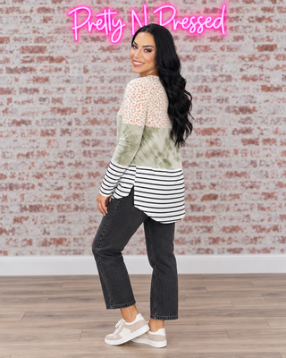 Natalie modeling the side and back construction of A Bold Blend Long Sleeve Top