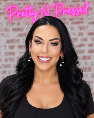 Natalie modeling ELINA EARRINGS at Pretty N Pressed Boutique