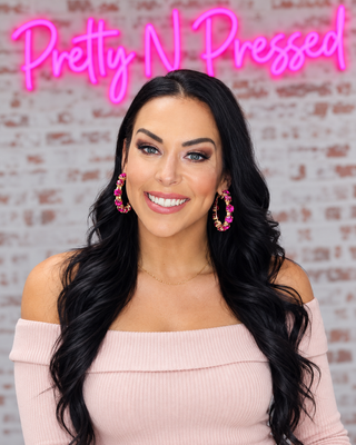 Natalie wearing Hot Pink Crystal Hoops