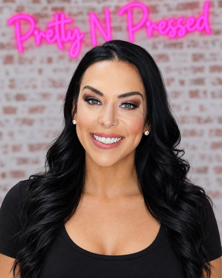 Natalie modeling OLIVE EARRINGS at Pretty N Pressed Boutique