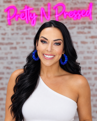 Natalie wearing Pusher Hoop Earrings