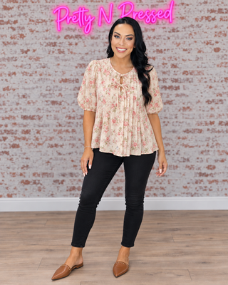 Natalie modeling With a Rosy Glow Cream Pleated Top in front-facing fall styling.