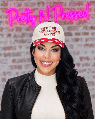 Natalie wearing I’m The Gift That Keeps Giving Polka Dot Hat with a naturally snug cap fit