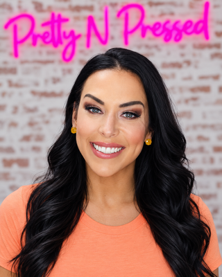 Natalie wearing Sunflower Surprise Earrings at Pretty N Pressed Boutique