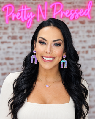 Natalie wearing Unicorn Earring at Pretty N Pressed Boutique